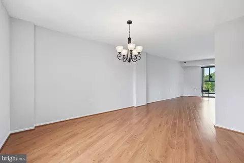 Living - 15101 Interlachen Dr #1-412, Silver Spring, MD 20906 photo 6 of 12
