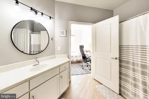 Bath - 8045 Newell St #118, Silver Spring, MD 20910 photo 2 of 2