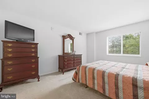 Bedroom - 15101 Interlachen Dr #1-224, Silver Spring, MD 20906 photo 3 of 5