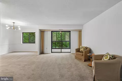 Living - 15100 Interlachen Dr #4-702, Silver Spring, MD 20906 photo 1 of 9