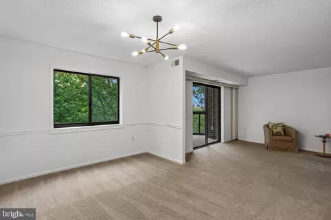 Living - 15100 Interlachen Dr #4-702, Silver Spring, MD 20906 photo 7 of 9