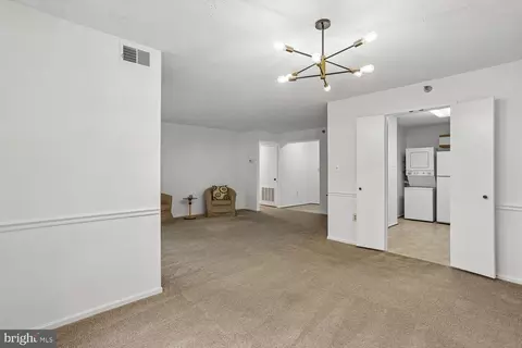 Living - 15100 Interlachen Dr #4-702, Silver Spring, MD 20906 photo 8 of 9