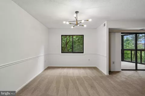 Living - 15100 Interlachen Dr #4-702, Silver Spring, MD 20906 photo 6 of 9