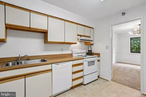 Kitchen - 15100 Interlachen Dr #4-702, Silver Spring, MD 20906 photo 1 of 1