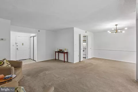 Living - 15100 Interlachen Dr #4-702, Silver Spring, MD 20906 photo 4 of 9