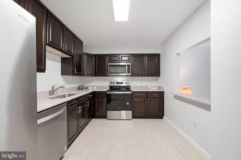 Kitchen - 15100 Interlachen Dr #4-124, Silver Spring, MD 20906 photo 2 of 2