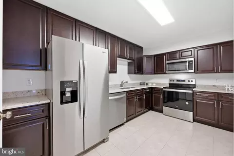 Kitchen - 15100 Interlachen Dr #4-124, Silver Spring, MD 20906 photo 1 of 2