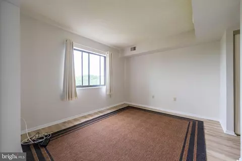 Living - 15101 Interlachen Dr #1-924, Silver Spring, MD 20906 photo 6 of 8