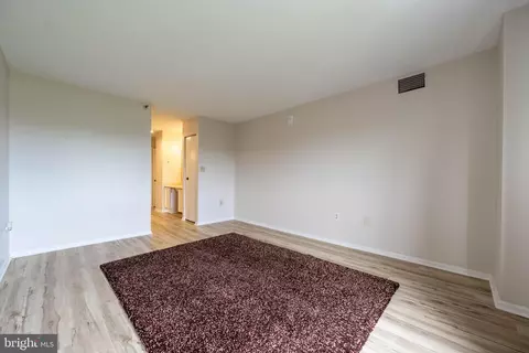 Living - 15101 Interlachen Dr #1-924, Silver Spring, MD 20906 photo 7 of 8