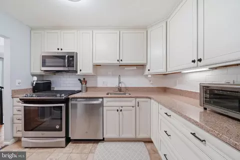 Kitchen - 2105 Unit 15-103 Walsh View Ter #15, Silver Spring, MD 20902 photo 2 of 4