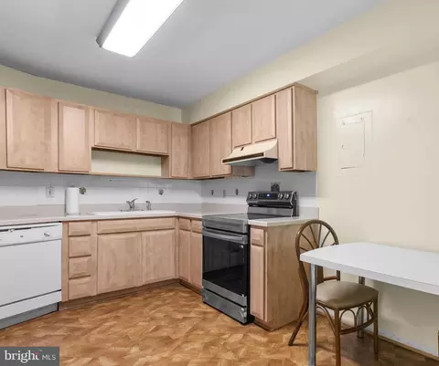 Kitchen - 15100 Interlachen Dr #4-117, Silver Spring, MD 20906 photo 1 of 2