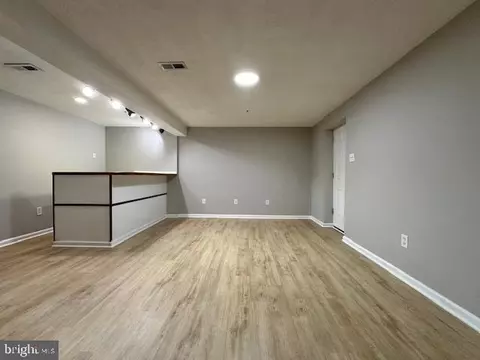 Living - 20527 Lowfield Dr, Germantown, MD 20874 photo 10 of 12
