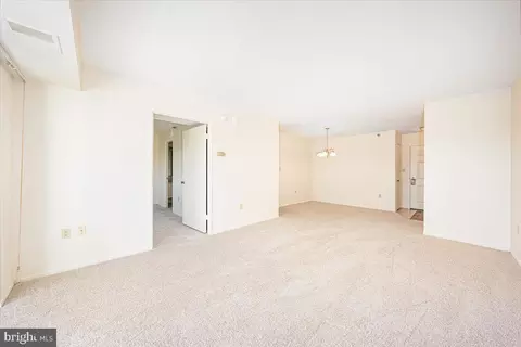 Living - 15101 Interlachen Dr #1-807, Silver Spring, MD 20906 photo 6 of 7