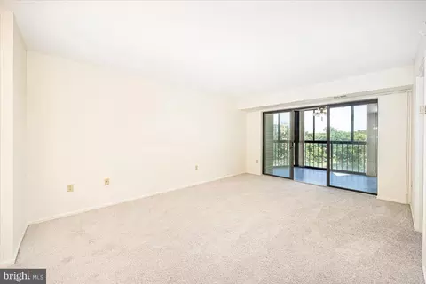 Living - 15101 Interlachen Dr #1-807, Silver Spring, MD 20906 photo 4 of 7