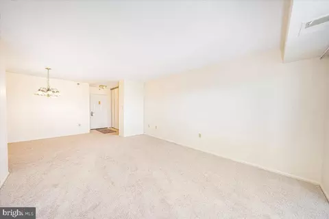 Living - 15101 Interlachen Dr #1-807, Silver Spring, MD 20906 photo 5 of 7