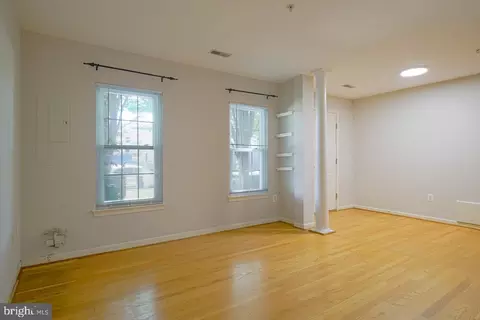 Living - 9423 Fields Rd, Gaithersburg, MD 20878 photo 1 of 11