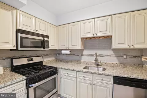 Kitchen - 2105 Walsh View Ter #15-301, Silver Spring, MD 20902 photo 1 of 3