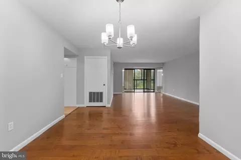 Living - 15101 Interlachen Dr #1-401, Silver Spring, MD 20906 photo 6 of 8