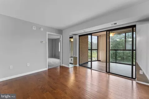Living - 15101 Interlachen Dr #1-401, Silver Spring, MD 20906 photo 7 of 8
