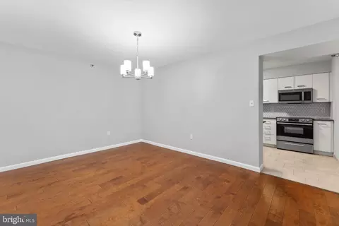 Living - 15101 Interlachen Dr #1-401, Silver Spring, MD 20906 photo 5 of 8