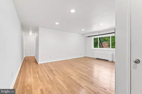 Living - 95 E Wayne Ave #212, Silver Spring, MD 20901 photo 6 of 8