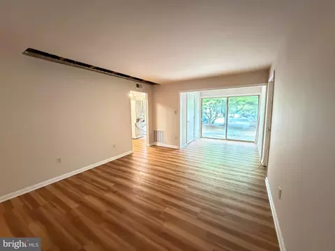 Living - 2403 Normandy Square Pl #12-CA, Silver Spring, MD 20906 photo 3 of 5