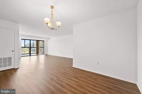 Living - 15115 Interlachen Dr #3-601, Silver Spring, MD 20906 photo 8 of 11