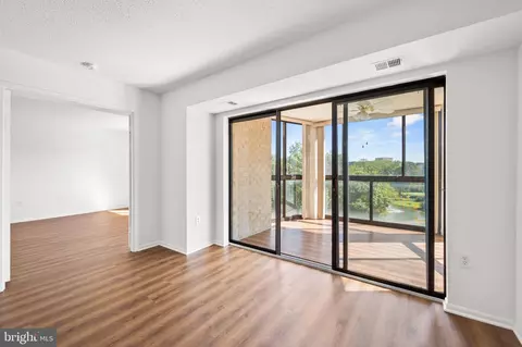 Living - 15115 Interlachen Dr #3-601, Silver Spring, MD 20906 photo 7 of 11