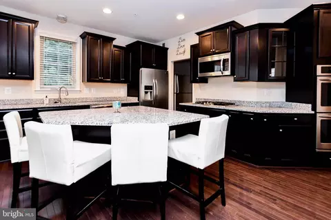 Kitchen - 9203 Rice Ave, Lanham, MD 20706 photo 3 of 15