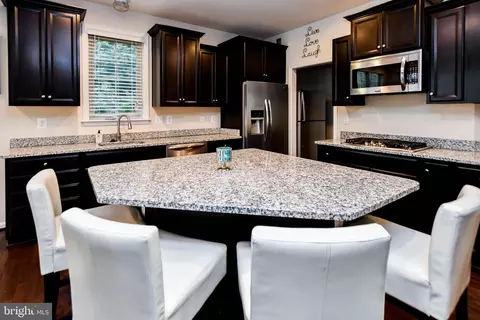 Kitchen - 9203 Rice Ave, Lanham, MD 20706 photo 14 of 15