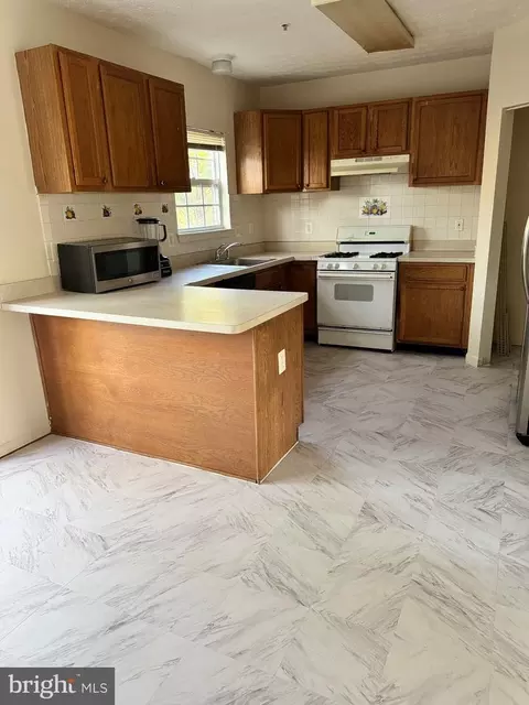 Kitchen - 6813 Forbes Blvd, Lanham, MD 20706 photo 4 of 6