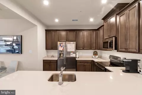 Kitchen - 10501 John Glenn St, Lanham, MD 20706 photo 2 of 7