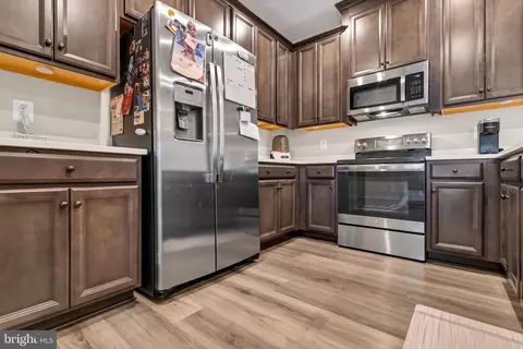 Kitchen - 10501 John Glenn St, Lanham, MD 20706 photo 5 of 7