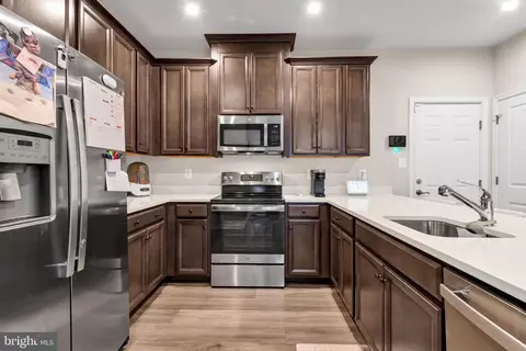 Kitchen - 10501 John Glenn St, Lanham, MD 20706 photo 4 of 7