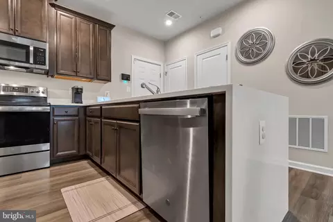 Kitchen - 10501 John Glenn St, Lanham, MD 20706 photo 6 of 7