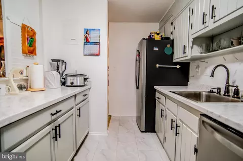 Kitchen - 9272 Adelphi Rd #103, Adelphi, MD 20783 photo 2 of 2