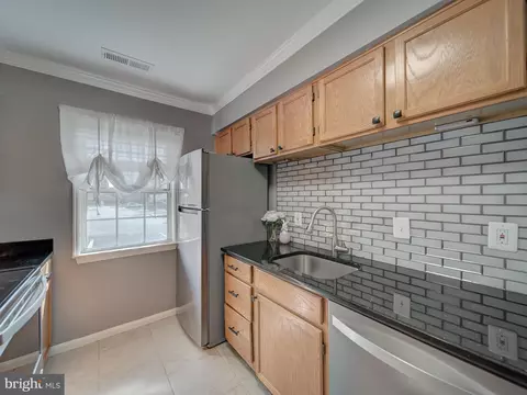 Kitchen - 9266 Cherry Ln #52, Laurel, MD 20708 photo 3 of 6