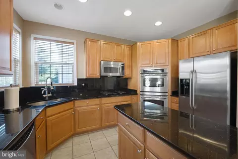 Kitchen - 13920 Chadsworth Ter, Laurel, MD 20707 photo 3 of 7