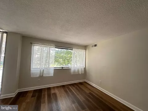 Living - 1836 Metzerott Rd #206, Hyattsville, MD 20783 photo 4 of 5