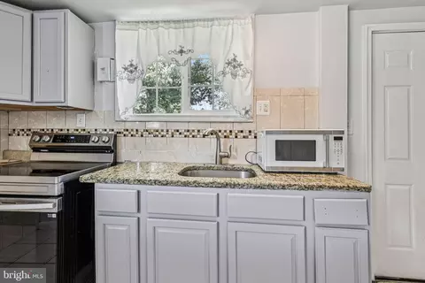 Kitchen - 6602 Cipriano Rd, Lanham, MD 20706 photo 7 of 7
