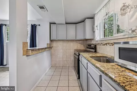 Kitchen - 6602 Cipriano Rd, Lanham, MD 20706 photo 6 of 7