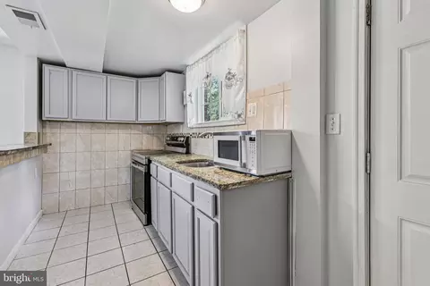 Kitchen - 6602 Cipriano Rd, Lanham, MD 20706 photo 5 of 7
