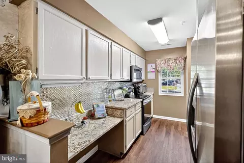 Kitchen - 9270 Cherry Ln #65, Laurel, MD 20708 photo 2 of 2