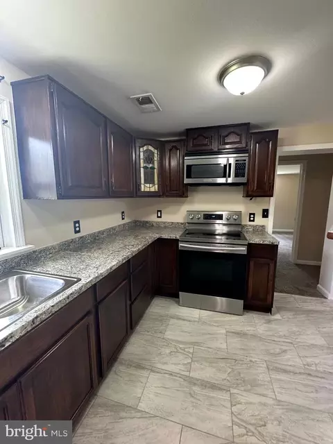 Kitchen - 6900 Cipriano Rd, Lanham, MD 20706 photo 1 of 2