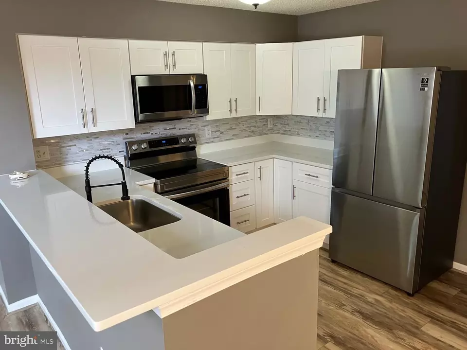 Kitchen - 14114 B Lauren Ln #27B, Laurel, MD 20707 photo 1 of 2