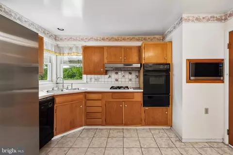 Kitchen - 7302 Powhatan St, Lanham, MD 20706 photo 2 of 4