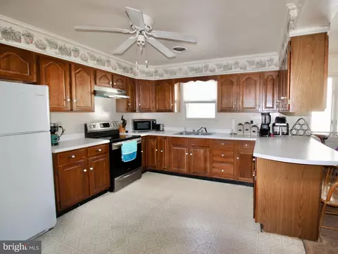 Kitchen - 107 E Maple Ave, Saint Michaels, MD 21663 photo 1 of 2