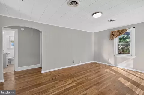 Living - 611 E Lincoln Ave, Salisbury, MD 21804 photo 1 of 2