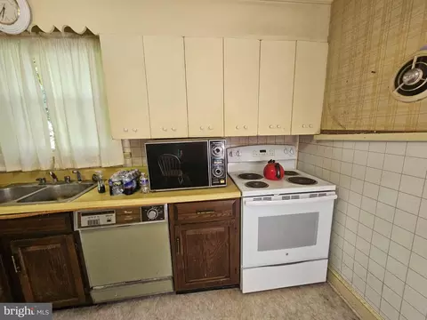 Kitchen - 305 Cedar Dr, Salisbury, MD 21804 photo 2 of 2