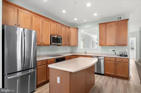 Kitchen - 11964 W War Dancer Ln #101, Berlin, MD 21811 photo 4 of 6